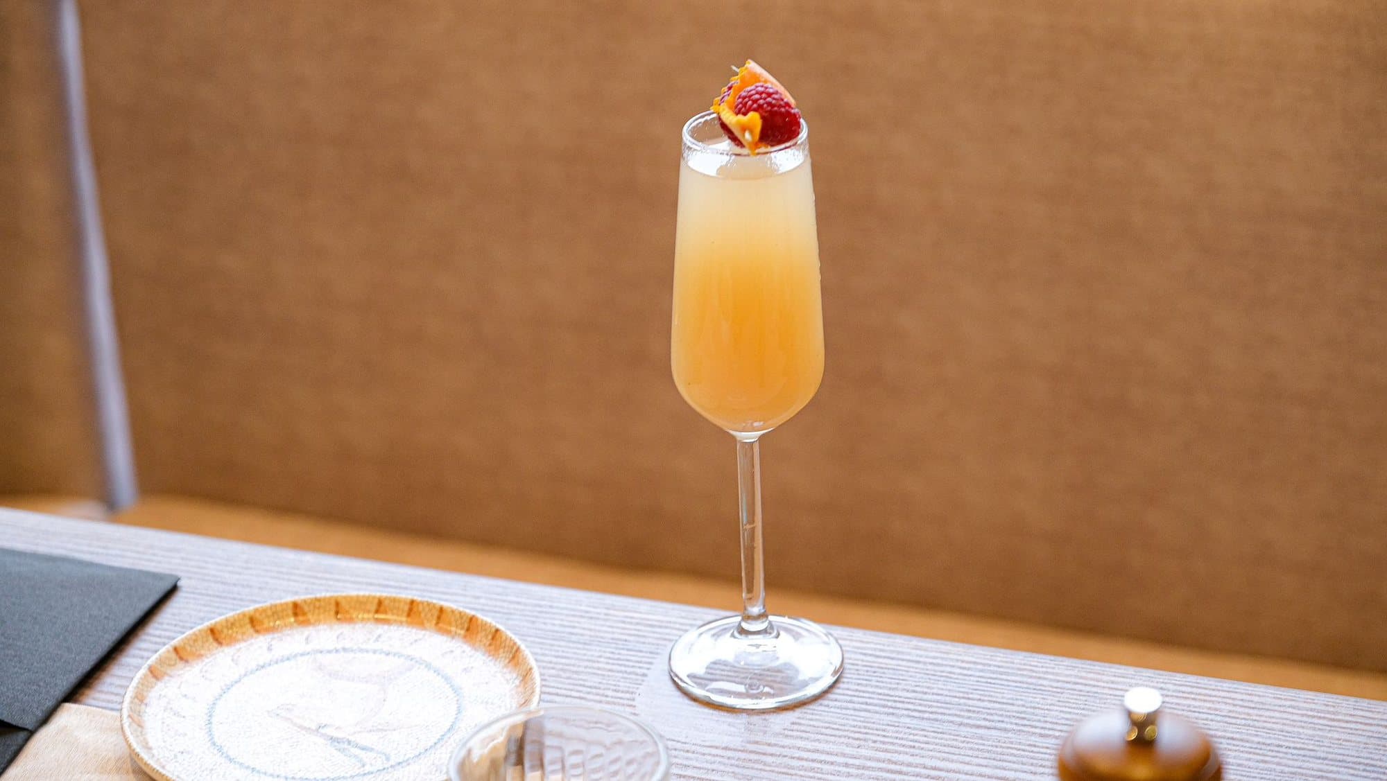 A spritz served in a flute at the table