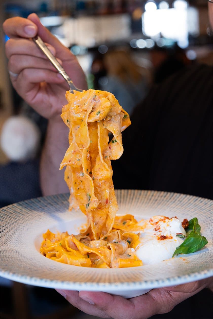 Pappardelle in creamy nduja sauce, served with burrata